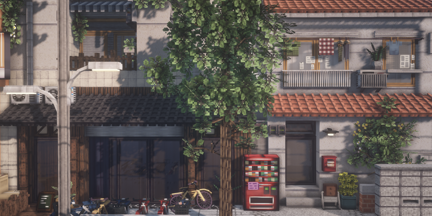 A residental building made in Minecraft, with a vending machine, balconies, and a bike rack.